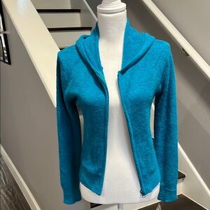 NWT Turquoise Blue ladies Super Soft Hoodie. Light weight it’s 100% Nylon. New